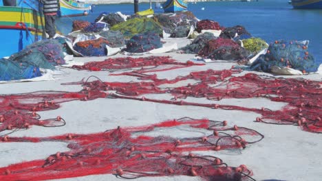 colorful bright fishing nets at marsaxlokk, malta