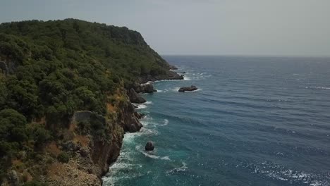 Pirate-bay-cove-green-trees-blue-sky-ocean