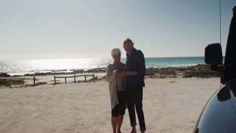 Senior-couple-enjoying-free-time-at-the-beach