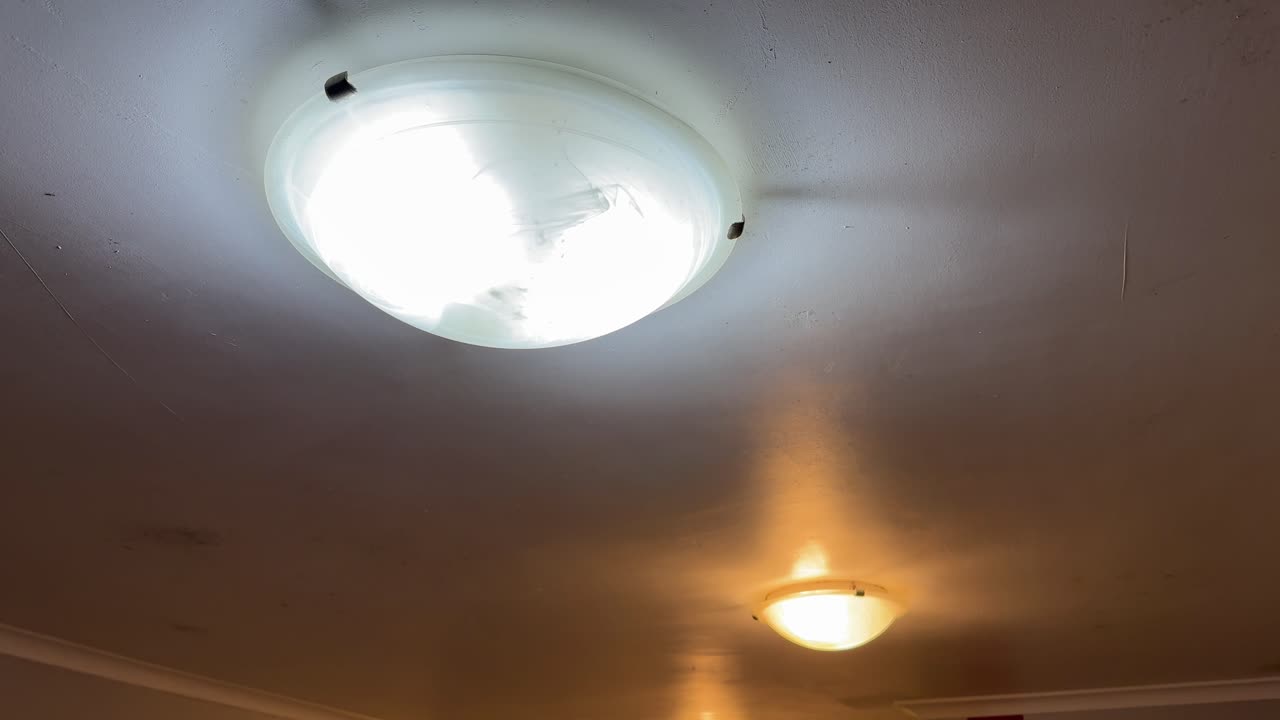 2 different colour lights in the same suburban home.