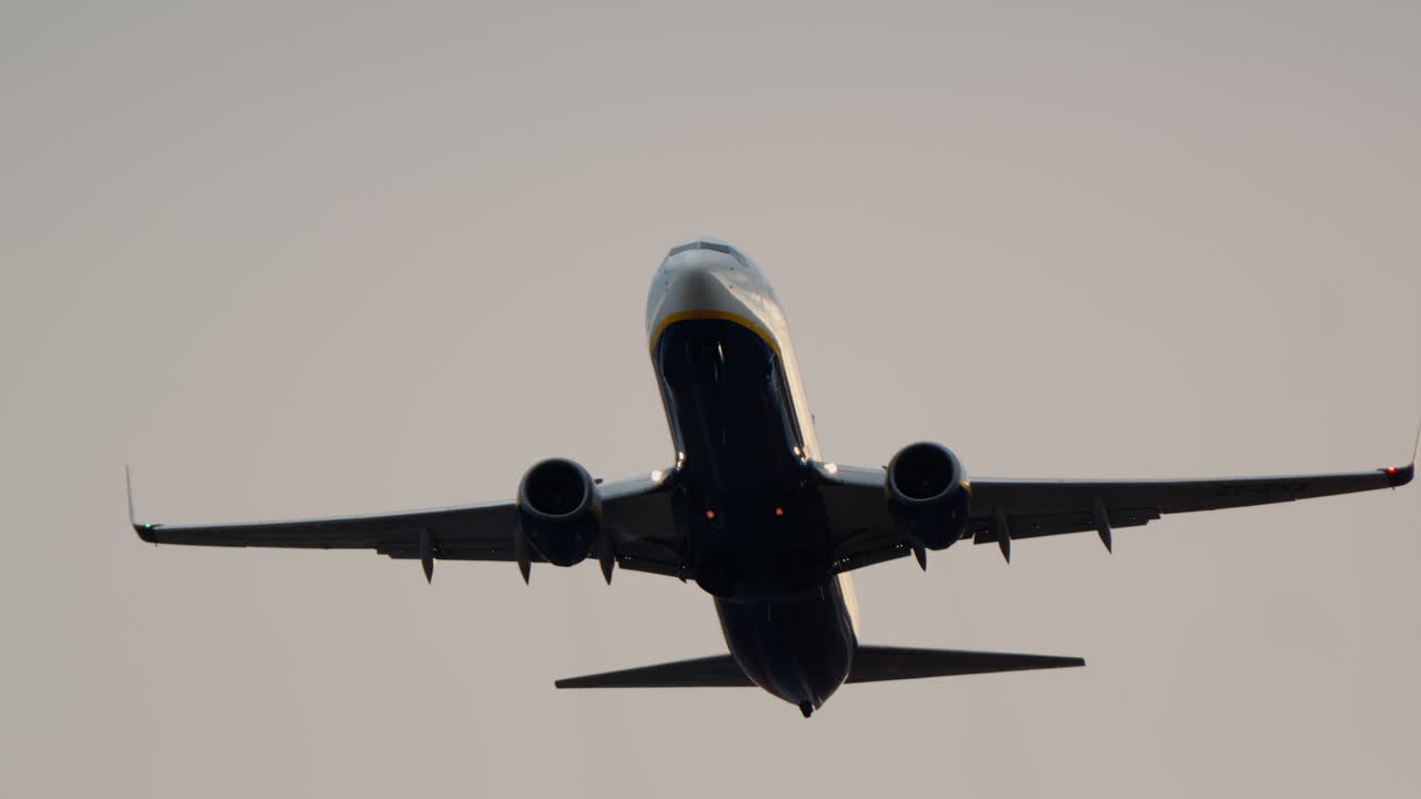 Commercial Jet Airplane Taking Off and Ascending into the Sky