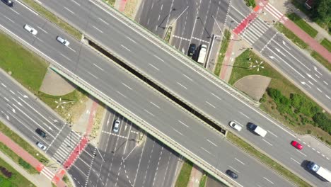 Summer-aerial-footage-of-transport-junction,-traffic-cross-road-junction-day-view-from-above-with-highway-road