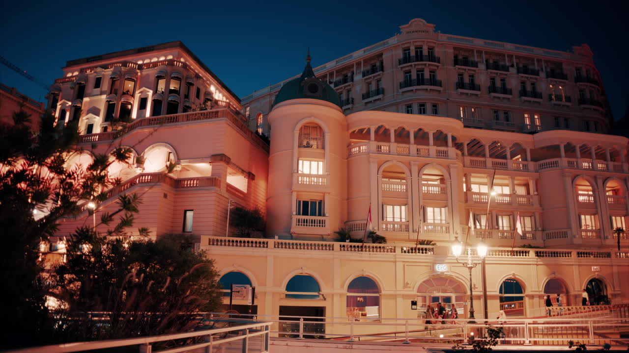 Monte Carlo, Monaco - October 14, 2024: The facade of Hotel de Paris in the evening