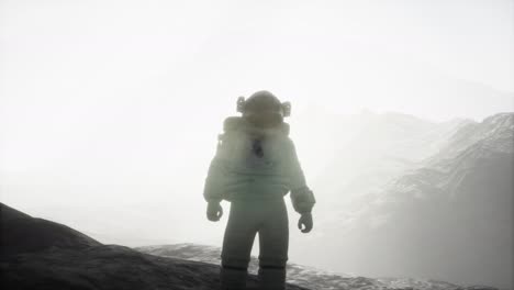 astronaut on another planet with dust and fog