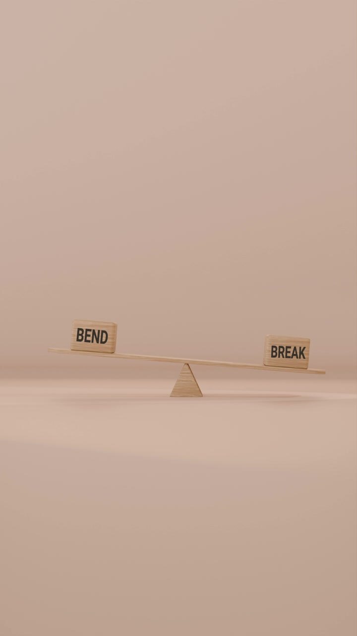 VERITCAL VIDEO OF BEND AND BREAK BALANCING ON SEESAW