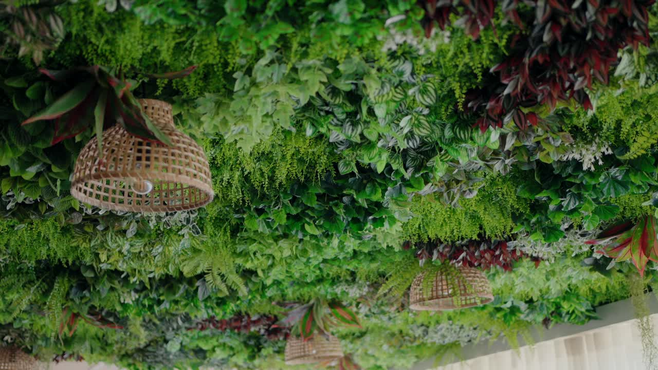 Modern Interior Design with Lush Green Wall and Bamboo Lamps