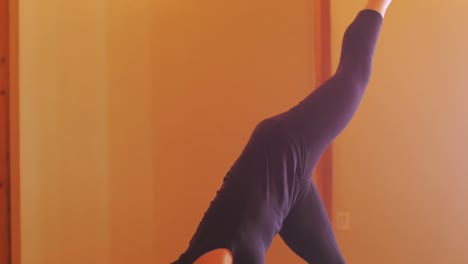 Woman-performing-stretching-exercise