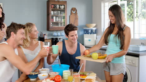 Smiling-friends-having-breakfast-