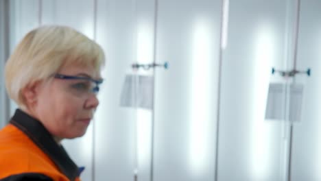 scientist examining a flask in a laboratory setting