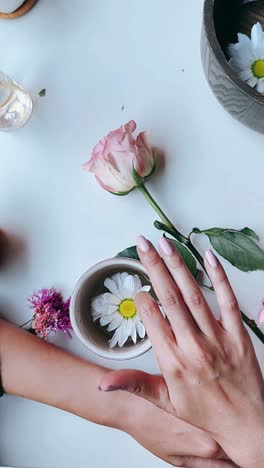 beautiful floral arrangement with a cup of flowers