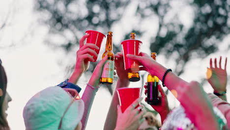 friends toasting with beer at a party