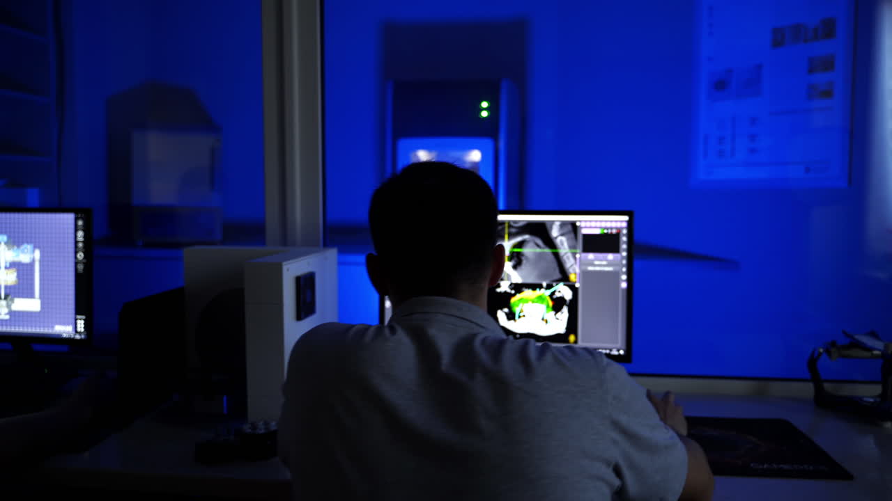 Dental technician at work. Milling dental system with computer control