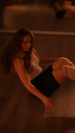 woman practicing pole dance
