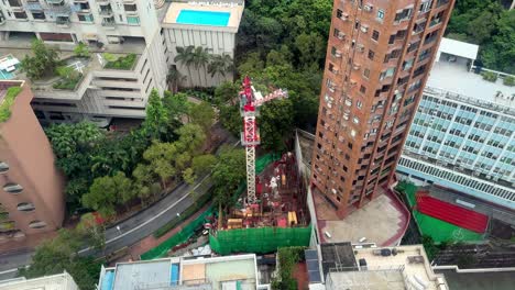 Building-Construction-Site-With-Tower-Crane-in-a-Residential-Area-in-Hong-Kong