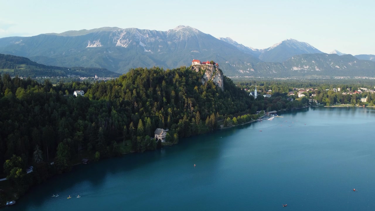 AERIAL Stunning Ascending Shot of Bled Castle and Lake Bled in Slovenia