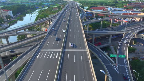 aerial photography of urban overpasses with cars coming and going, urban traffic，the vehicle is driving on urban roads