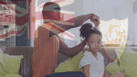 styling daughter's hair, father at home with british flag animation overlay