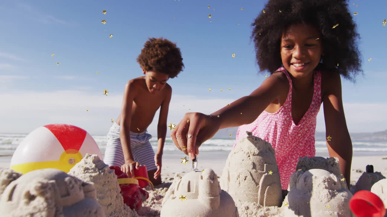 On beach, children building sandcastles with star animation overlay in background