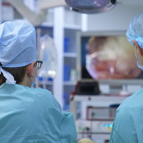 performing laparoscopy surgery on patient