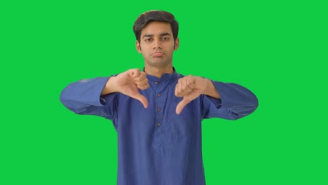 Disappointed-Indian-man-showing-thumbs-down-Green-screen