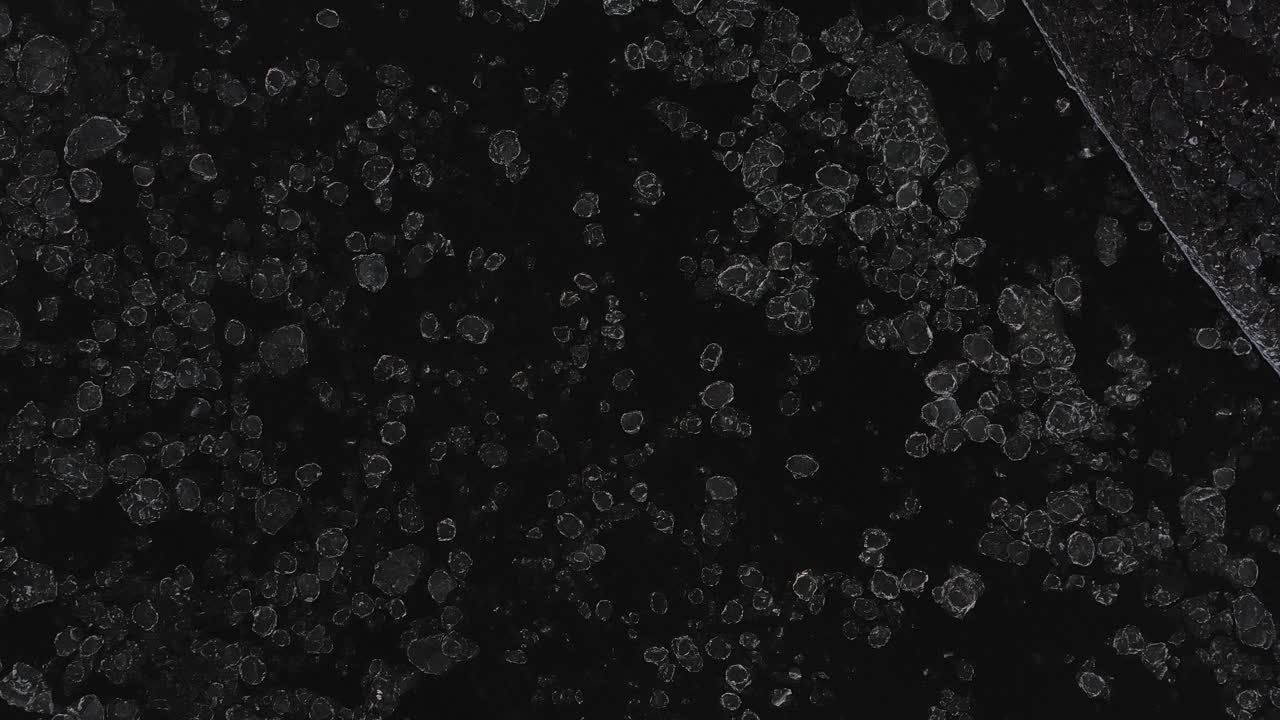 Top down aerial view of ice floes in the Neris river. Winter season in Lithuania