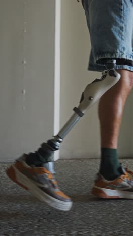 Person with prosthetic leg walking