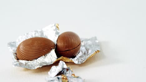 Chocolate-Easter-eggs-in-foil-on-white-background