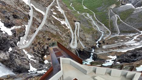 Aerial-tracking-over-Stigfossen-Waterfall,-Trollstigen-Road-overlook,-Norway