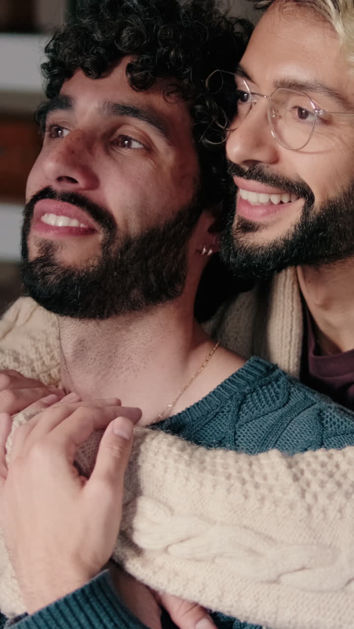 Gay Couple Embracing at Home