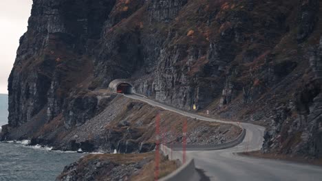 The-narrow-road-winds-along-the-coastline-at-the-bottom-of-the-mountain