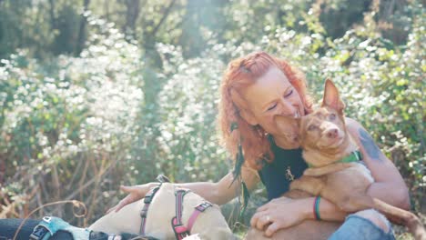 woman with her dogs enjoying the outdoors