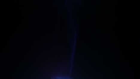 colors smoke in dark background