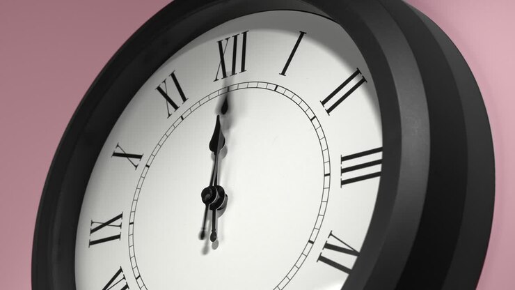Latin Clock Face on Rosy Rose Pink Wall in Time Lapse