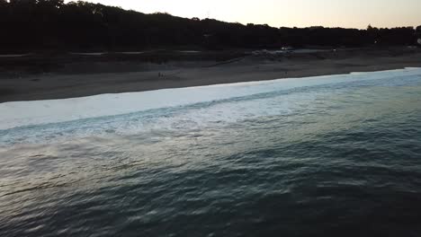 Aerial-View-of-beach-at-sunrise