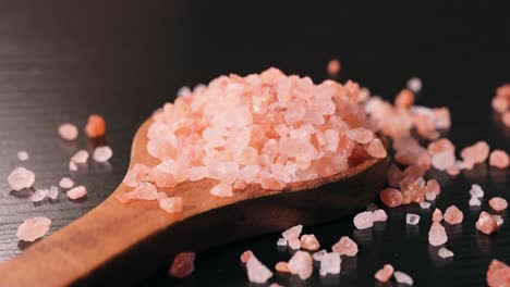 Himalayan-pink-salt-in-a-wooden-is-used-to-flavor-food.-Due-mainly-to-marketing-costs,-pink-Himalayan-salt-is-up-to-twenty-times-more-expensive-than-table-or-sea-salt.