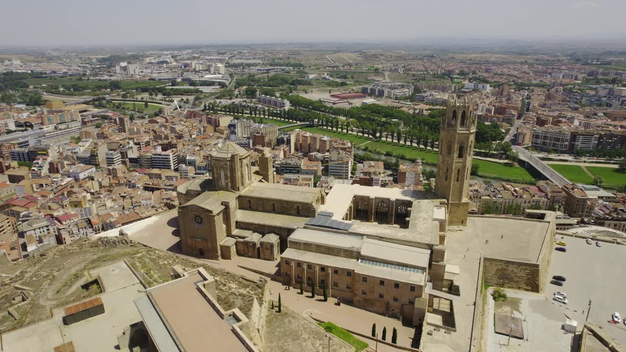 Aerial View of a Historic Cathedral Overlooking a European City