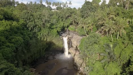 aerial pedestal on waterfall, tegenungan, big cascade in bali, indonesian