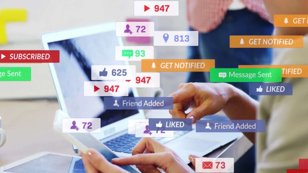 Animation of social media text on banners with cursors over woman using laptop