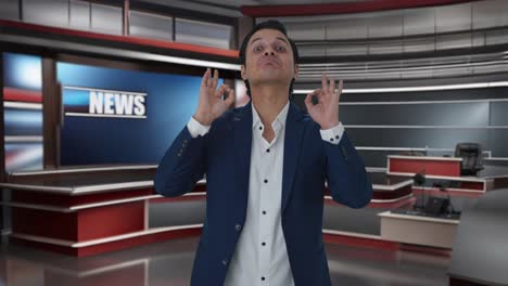 happy indian journalist showing okay sign