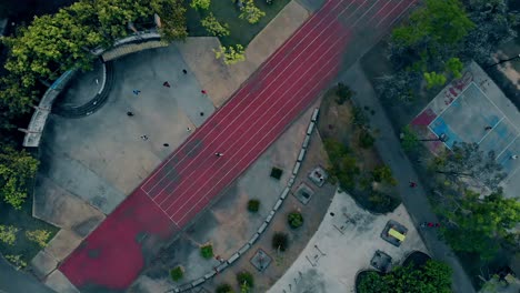 abandoned-playground-basketball-platform-and-running-track