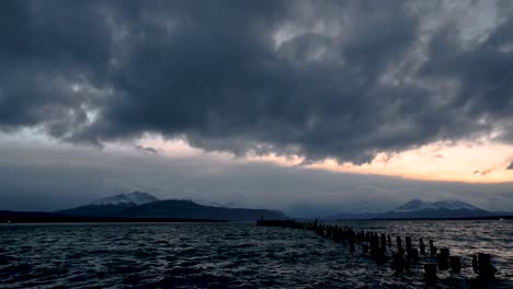 amazing time lapse of cloud formation moving over snowed peaks at sunset in puerto natales, chilean patagonia