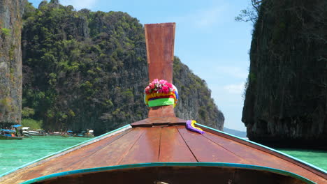 Long-tail-boat-sailing-Thai-paradise-of-Phi-Phi-islands