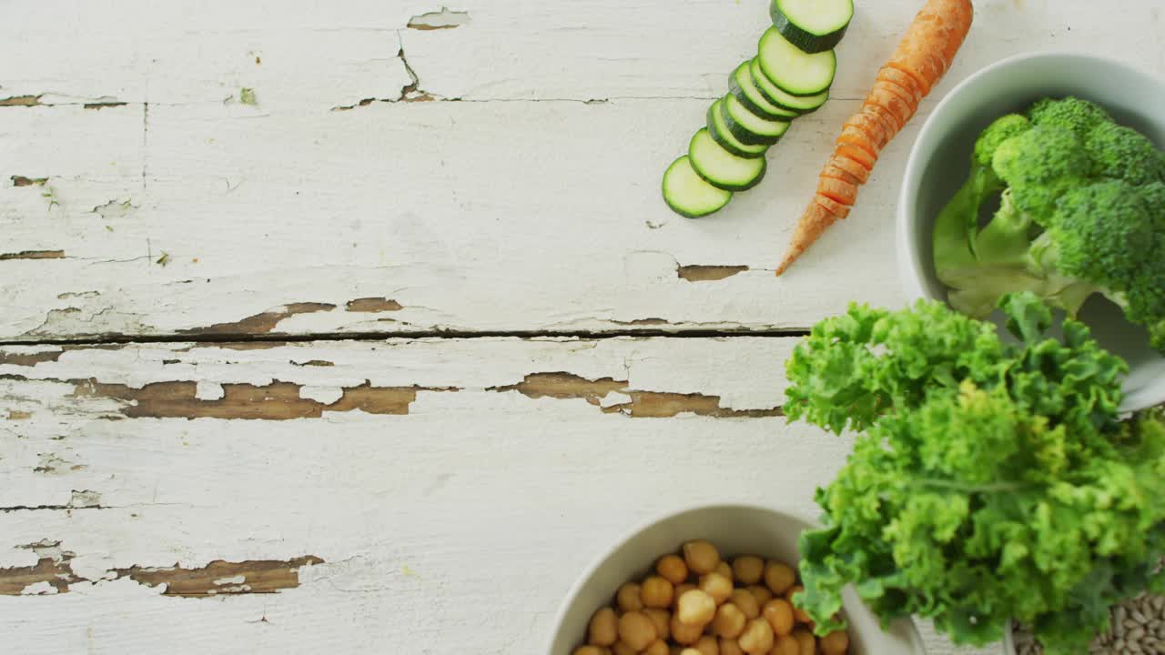 Heart icon appearing over chickpeas floating up spawning heart cluster celebrating fresh produce