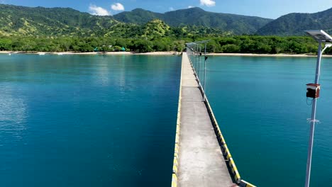 loh liang cruise ship pier at komodo island which is used as an access point to see the dragons, aerial flyover shot