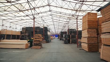 lumber warehouse with workers