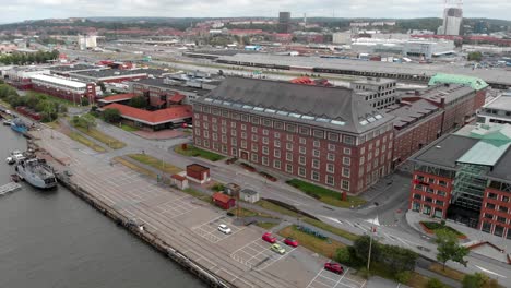 Aerial-dolly-in-shot-of-famous-oriental-restaurant-Pagoden-with-Chinese-inspired-architecture-located-on-the-riverside-in-Gothenburg-Sweden