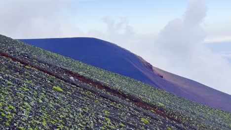 a thrilling trek up mount fuji takes you through diverse landscapes, from lush foothills to rocky slopes, ending with panoramic summit views