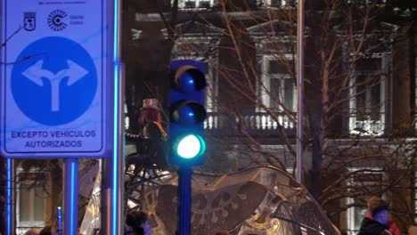 giant metal elephant sculpture in city parade at night