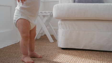 cute-baby-legs-learning-to-walk-happy-toddler-having-fun-taking-first-steps-walking-enjoying-childhood-curiosity-at-home-4k