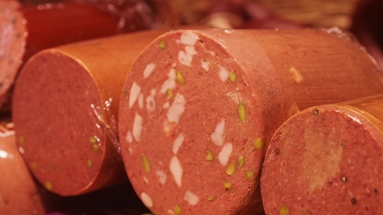 Close-up of Cured Mortadella and Salami with Pistachios